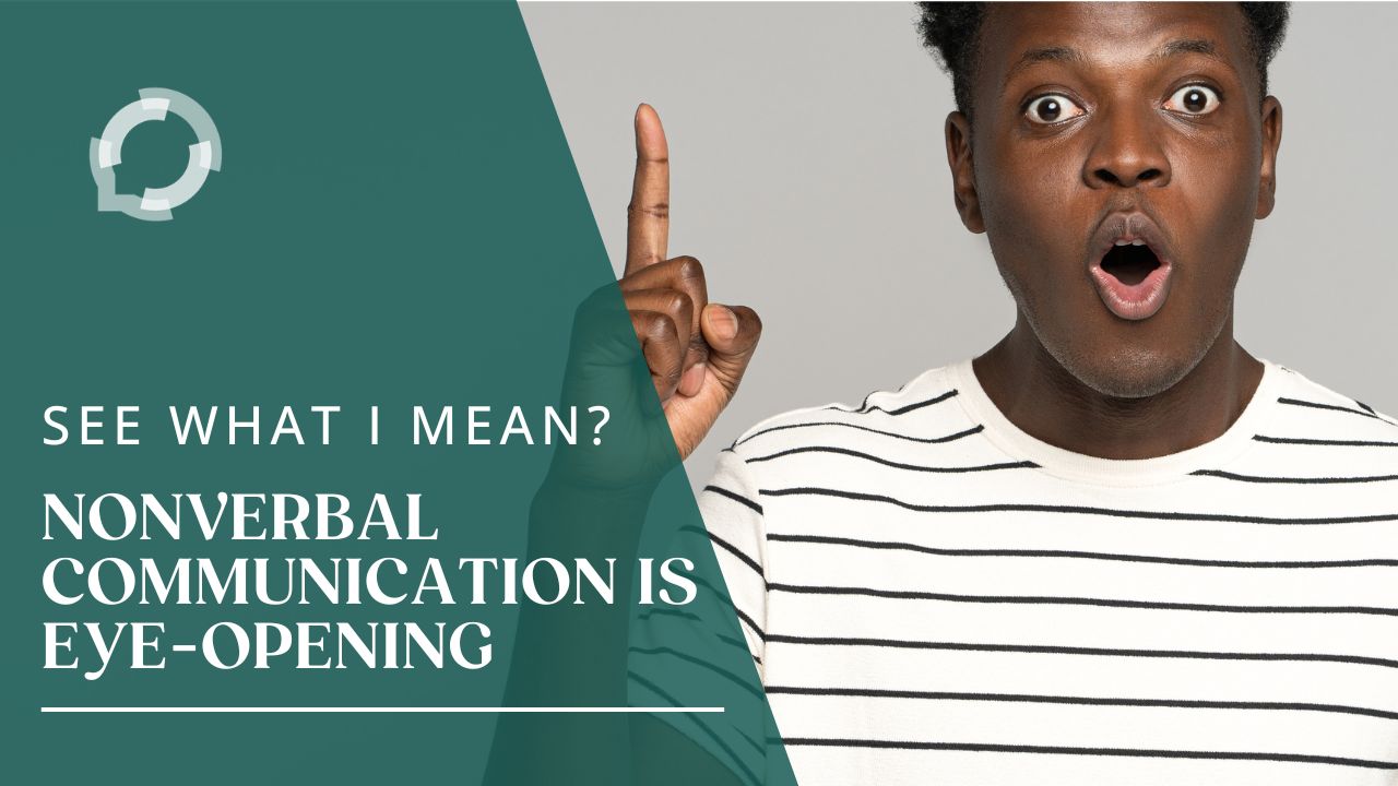 A black man has wide open eyes and mouth. His right index finger points up. The text reads, "See What I Mean? Nonverbal Communication is Eye-Opening"